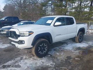 2023 Toyota Tacoma 4WD SR with VIN 3TMCZ5ANXPM599135, listed as a IAAI auction lot 41442577 with 26,901 mi miles. Bid and sale history available at carsss.com. Image 18.
