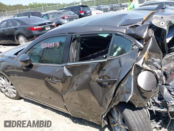 2017 Mazda 3 Grand Touring z VIN 3MZBN1M39HM127811, wystawiony jako IAAI lot #42060315 z przebiegiem Nie podano mil oraz . Historia ofert i sprzedaży dostępna na DreamBid. Obrazek 13.