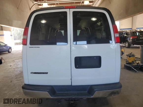 2018 Chevrolet Express Passenger LT с VIN 1GAZGPFGXJ1244873, выставлен на аукционе Copart как лот 44595725 с пробегом 149 127 миль миль и Списание • Salvage title. История ставок и продаж доступна на DreamBid. Изображение 6.