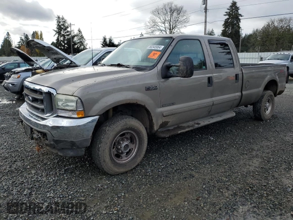2003 Ford F-350 XL with VIN 1FTSW31F13EA13259, listed as a Copart auction lot 80345954 with 209,898 mi miles and Salvage title. Bid and sale history available at DreamBid. Image 1.
