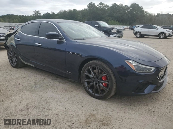 2019 Maserati Ghibli with VIN ZAM57XSS3K1319197, listed as a Copart auction lot 70454084 with 28,584 mi miles and Salvage Title. Bid and sale history available at carsss.com. Image 4.