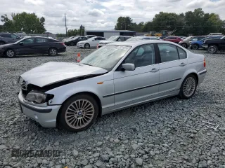 2003 BMW 3 Series 330i with VIN WBAEV53423KM30265, listed as a Copart auction lot 70214374 with 152,171 mi miles and Salvage Title. Bid and sale history available at carsss.com. Image 1.