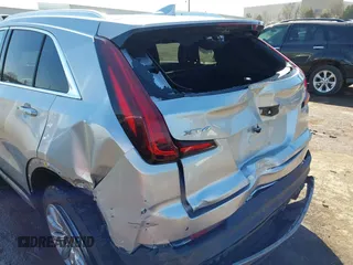 2019 Cadillac XT4 FWD Premium Luxury with VIN 1GYFZCR47KF110481, listed as a IAAI auction lot 41771338 with 103,124 mi miles and . Bid and sale history available at carsss.com. Image 12.