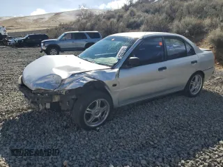 1999 Mitsubishi Mirage DE z VIN JA3AY26A5XU021226, wystawiony jako Copart lot #48822825 z przebiegiem Nie podano mil oraz Szkoda całkowita • Salvage title. Historia ofert i sprzedaży dostępna na DreamBid. Obrazek 1.