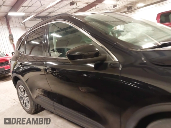 2021 Ford Escape SEL with VIN 1FMCU9H92MUA28112, listed as a IAAI auction lot 41510577 with 57,407 mi miles and . Bid and sale history available at DreamBid. Image 14.