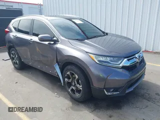 2018 Honda CR-V Touring with VIN 7FARW1H9XJE018575, listed as a IAAI auction lot 41747192 with 83,699 mi miles and . Bid and sale history available at carsss.com. Image 1.