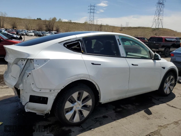 2022 Tesla Model Y Long Range with VIN 7SAYGAEE4NF534588, listed as a Copart auction lot 53274995 with 20,768 mi miles and Salvage Title. Bid and sale history available at DreamBid. Image 3.