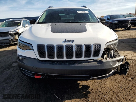 2022 Jeep Cherokee Trailhawk with VIN 1C4PJMBX3ND505107, listed as a Copart auction lot 77418384 with 12,952 mi miles and Clean Title. Bid and sale history available at carsss.com. Image 5.