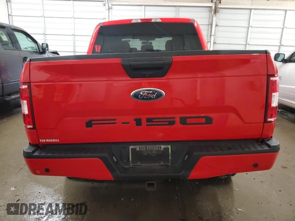 2020 Ford F-150 XL with VIN 1FTEW1E50LKF31657, listed as a Copart auction lot 83083394 with 56,669 mi miles and Salvage title. Bid and sale history available at DreamBid. Image 6.