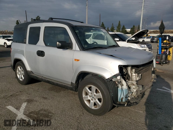 2010 Honda Element EX with VIN 5J6YH1H76AL003336, listed as a Copart auction lot 89178895 with 126,907 mi miles and Salvage Title. Bid and sale history available at DreamBid. Image 4.