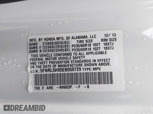 2014 Honda Odyssey Touring with VIN 5FNRL5H95EB059729, listed as a IAAI auction lot 42148110 with 135,304 mi miles and . Bid and sale history available at DreamBid. Image 9.