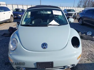 2003 Volkswagen Beetle GLS z VIN 3VWCK21YX3M304572, wystawiony jako IAAI lot #41286079 z przebiegiem 42 450 mil mil oraz . Historia ofert i sprzedaży dostępna na DreamBid. Obrazek 12.