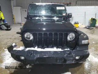 2019 Jeep Wrangler Unlimited Sport Altitude with VIN 1C4HJXDG7KW511592, listed as a Copart auction lot 45100125 with 53,669 mi miles and Salvage title. Bid and sale history available at DreamBid. Image 5.