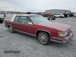 1987 Cadillac DeVille z VIN 1G6CD1181H4318101, wystawiony jako Copart lot #75354324 z przebiegiem Nie podano mil oraz Szkoda całkowita • Salvage title. Historia ofert i sprzedaży dostępna na DreamBid. Obrazek 4.