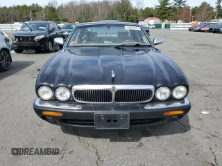 2002 Jaguar XJ 8 with VIN SAJDA14C62LF40435, listed as a Copart auction lot 52022645 with 153,703 mi miles and Salvage title. Bid and sale history available at DreamBid. Image 5.