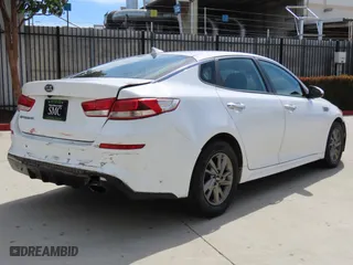 2019 Kia Optima LX with VIN 5XXGT4L36KG329998, listed as a Copart auction lot 52011715 with 123,942 mi miles and Salvage Title. Bid and sale history available at carsss.com. Image 4.