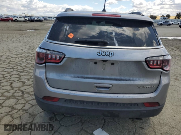 2020 Jeep Compass Limited with VIN 3C4NJCCB3LT128807, listed as a Copart auction lot 56673705 with 94,903 mi miles and Salvage title. Bid and sale history available at DreamBid. Image 6.