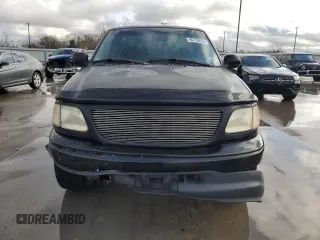 2000 Ford F-150 XL with VIN 1FTZF1725YNB93067, listed as a Copart auction lot 86750464 with Not provided miles and Salvage title. Bid and sale history available at DreamBid. Image 5.