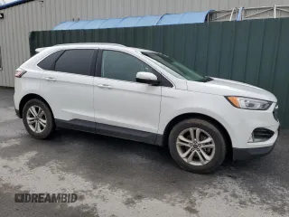 2020 Ford Edge SEL z VIN 2FMPK3J90LBB01559, wystawiony jako Copart lot #61365305 z przebiegiem 120 050 mil mil oraz Czysty tytuł • Clean title. Historia ofert i sprzedaży dostępna na DreamBid. Obrazek 4.