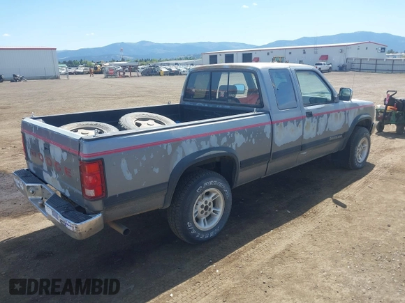 1992 Dodge Dakota with VIN 1B7GG23X9NS683519, listed as a IAAI auction lot 42217984 with 178,152 mi miles and . Bid and sale history available at DreamBid. Image 4.