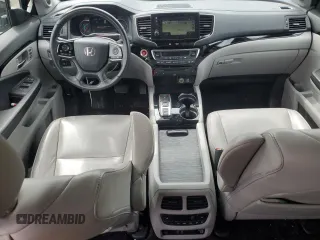 2019 Honda Pilot Touring 8-Passenger z VIN 5FNYF5H91KB033661, wystawiony jako Copart lot #56650155 z przebiegiem 73 512 mil mil oraz Szkoda całkowita • Salvage title. Historia ofert i sprzedaży dostępna na DreamBid. Obrazek 8.