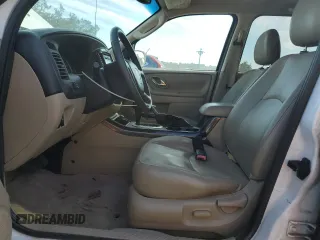2006 Mazda Tribute S with VIN 4F2YZ06116KM28522, listed as a Copart auction lot 83670154 with Not Provided miles and Non Repairable. Bid and sale history available at carsss.com. Image 7.