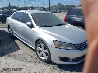 2012 Volkswagen Passat SE with VIN 1VWBP7A3XCC048773, listed as a IAAI auction lot 41362054 with 235,242 mi miles. Bid and sale history available at carsss.com. Image 1.