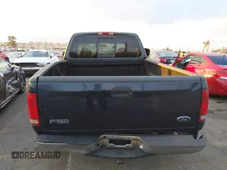 1999 Ford F-150 XL with VIN 1FTRX17L3XKB32547, listed as a IAAI auction lot 41331882 with Not Provided miles. Bid and sale history available at carsss.com. Image 16.