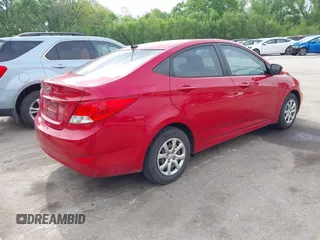 2014 Hyundai Accent GLS with VIN KMHCT4AEXEU600395, listed as a IAAI auction lot 42141052 with 172,284 mi miles. Bid and sale history available at carsss.com. Image 4.