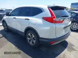 2019 Honda CR-V LX with VIN 2HKRW5H33KH407463, listed as a IAAI auction lot 42034584 with 85,454 mi miles and . Bid and sale history available at DreamBid. Image 3.