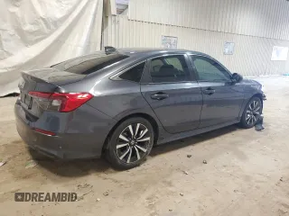 2023 Honda Civic EX z VIN 2HGFE1F71PH311773, wystawiony jako Copart lot #59987065 z przebiegiem 40 525 mil mil oraz Czysty tytuł • Clean title. Historia ofert i sprzedaży dostępna na DreamBid. Obrazek 3.