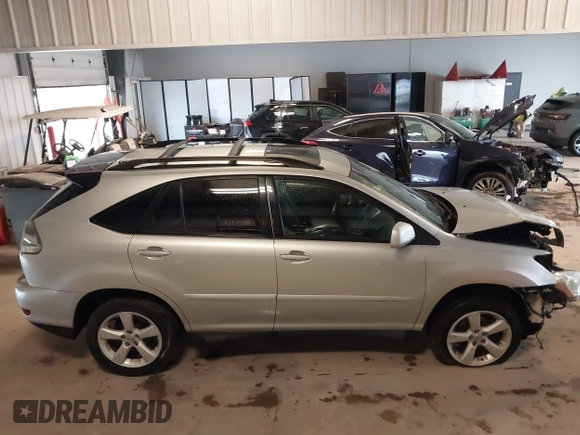 2005 Lexus RX 330 z VIN 2T2HA31UX5C075123, wystawiony jako IAAI lot #41946042 z przebiegiem 160 623 mil mil oraz . Historia ofert i sprzedaży dostępna na DreamBid. Obrazek 13.