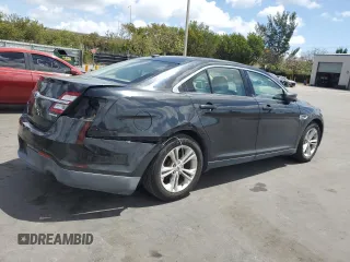 2015 Ford Taurus SE with VIN 1FAHP2D86FG140750, listed as a Copart auction lot 54390145 with 128,163 mi miles and Salvage Title. Bid and sale history available at carsss.com. Image 3.