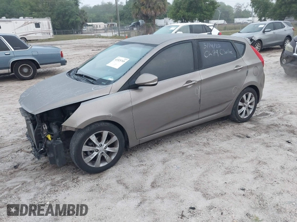 2014 Hyundai Accent SE with VIN KMHCU5AE0EU169214, listed as a IAAI auction lot 41925749 with 119,544 mi miles. Bid and sale history available at carsss.com. Image 2.