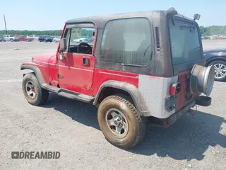 1995 Jeep Wrangler S z VIN 1J4FY19P9SP321158, wystawiony jako IAAI lot #42320918 z przebiegiem 189 918 mil mil oraz . Historia ofert i sprzedaży dostępna na DreamBid. Obrazek 3.