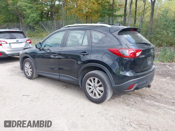 2016 Mazda CX-5 Sport with VIN JM3KE2BE8G0804398, listed as a IAAI auction lot 40490953 with 116,279 mi miles and . Bid and sale history available at DreamBid. Image 3.