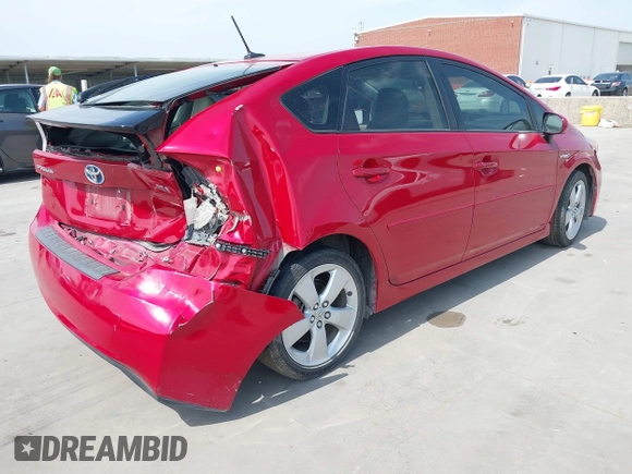 2012 Toyota Prius One with VIN JTDKN3DU8C5499775, listed as a IAAI auction lot 42065022 with 104,499 mi miles and . Bid and sale history available at carsss.com. Image 4.