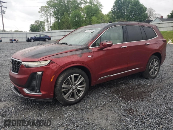 2021 Cadillac XT6 Premium Luxury with VIN 1GYKPDRSXMZ231922, listed as a Copart auction lot 51981065 with 16,784 mi miles and Salvage Title. Bid and sale history available at carsss.com. Image 1.