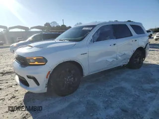 2021 Dodge Durango R/T with VIN 1C4SDHCT0MC660867, listed as a Copart auction lot 87227934 with 64,594 mi miles and Salvage Title. Bid and sale history available at DreamBid. Image 1.