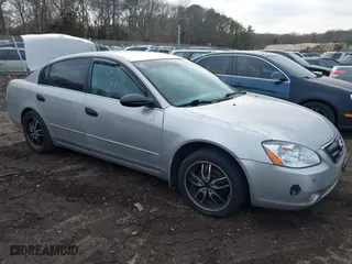 2004 Nissan Altima S with VIN 1N4AL11D74C140091, listed as a IAAI auction lot 41627388 with 999,999 mi miles. Bid and sale history available at carsss.com. Image 1.
