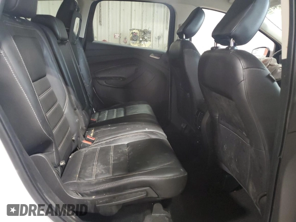 2019 Ford Escape Titanium z VIN 1FMCU9J97KUA85865, wystawiony jako Copart lot #56643135 z przebiegiem Nie podano mil oraz Szkoda całkowita • Salvage title. Historia ofert i sprzedaży dostępna na DreamBid. Obrazek 11.