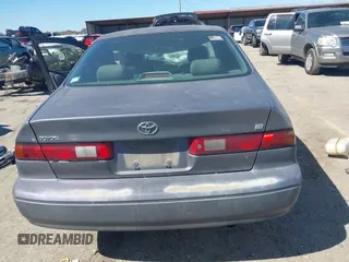 1998 Toyota Camry LE z VIN JT2BF22K6W0117441, wystawiony jako IAAI lot #41720451 z przebiegiem Nie podano mil oraz . Historia ofert i sprzedaży dostępna na DreamBid. Obrazek 16.