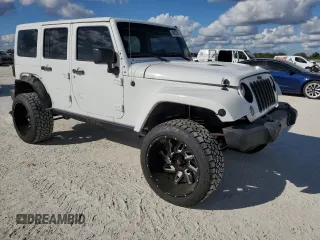2015 Jeep Wrangler Unlimited Sahara with VIN 1C4BJWEG6FL614671, listed as a Copart auction lot 86052284 with 92,894 mi miles and Salvage title. Bid and sale history available at DreamBid. Image 4.