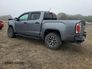 2021 GMC Canyon 4WD AT4 w/Cloth with VIN 1GTG6FEN8M1115918, listed as a Copart auction lot 80592964 with 59,888 mi miles and Salvage Title. Bid and sale history available at carsss.com. Image 2.