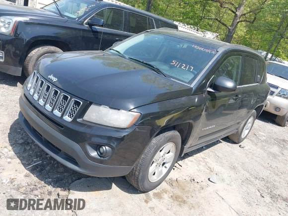 2014 Jeep Compass Sport with VIN 1C4NJCBA0ED511217, listed as a IAAI auction lot 42008976 with 210,780 mi miles. Bid and sale history available at carsss.com. Image 2.