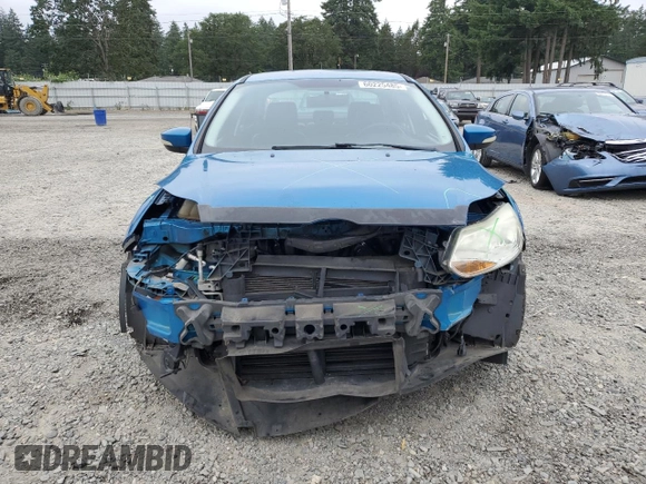 2013 Ford Focus SE with VIN 1FADP3F25DL295338, listed as a Copart auction lot 60225485 with 82,979 mi miles and Salvage title. Bid and sale history available at DreamBid. Image 5.