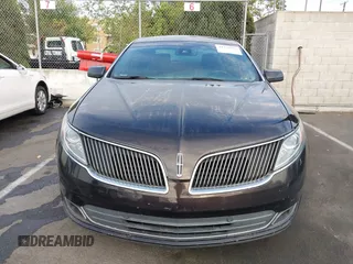 2013 Lincoln MKS with VIN 1LNHL9DK6DG608673, listed as a IAAI auction lot 42756289 with 103,118 mi miles and . Bid and sale history available at DreamBid. Image 12.