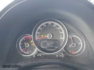 2018 Volkswagen Beetle S with VIN 3VWFD7AT5JM710121, listed as a IAAI auction lot 41264655 with 37,871 mi miles. Bid and sale history available at carsss.com. Image 7.