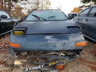 1991 Toyota MR2 z VIN JT2SW22M2M0010031, wystawiony jako Copart lot #61644244 z przebiegiem 74 912 mil mil oraz Nie do naprawy • Non repairable. Historia ofert i sprzedaży dostępna na DreamBid. Obrazek 5.