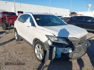 2015 Lincoln MKC with VIN 5LMCJ1A91FUJ36984, listed as a IAAI auction lot 41212411 with 94,751 mi miles. Bid and sale history available at carsss.com. Image 1.